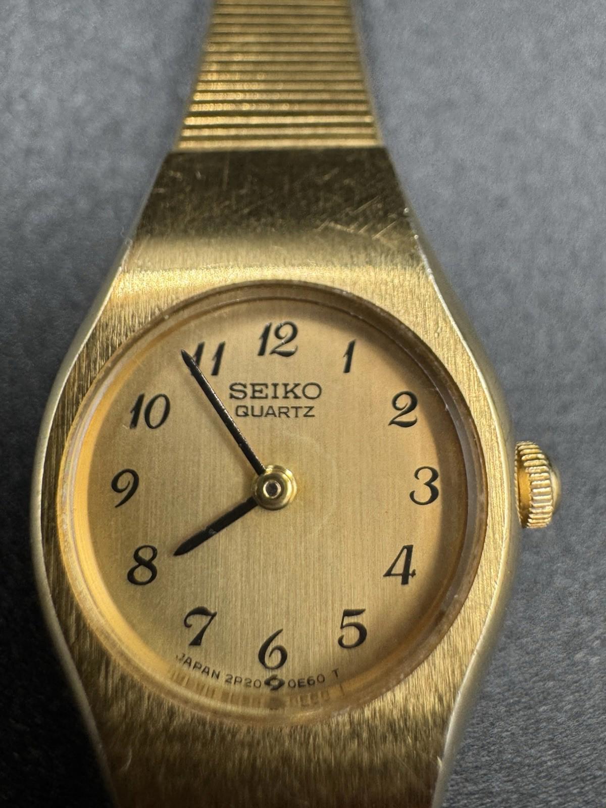 Seiko Quartz Dress Watch Women 2P20-0A89 Gold Dial & Band New Batttery Works VG+