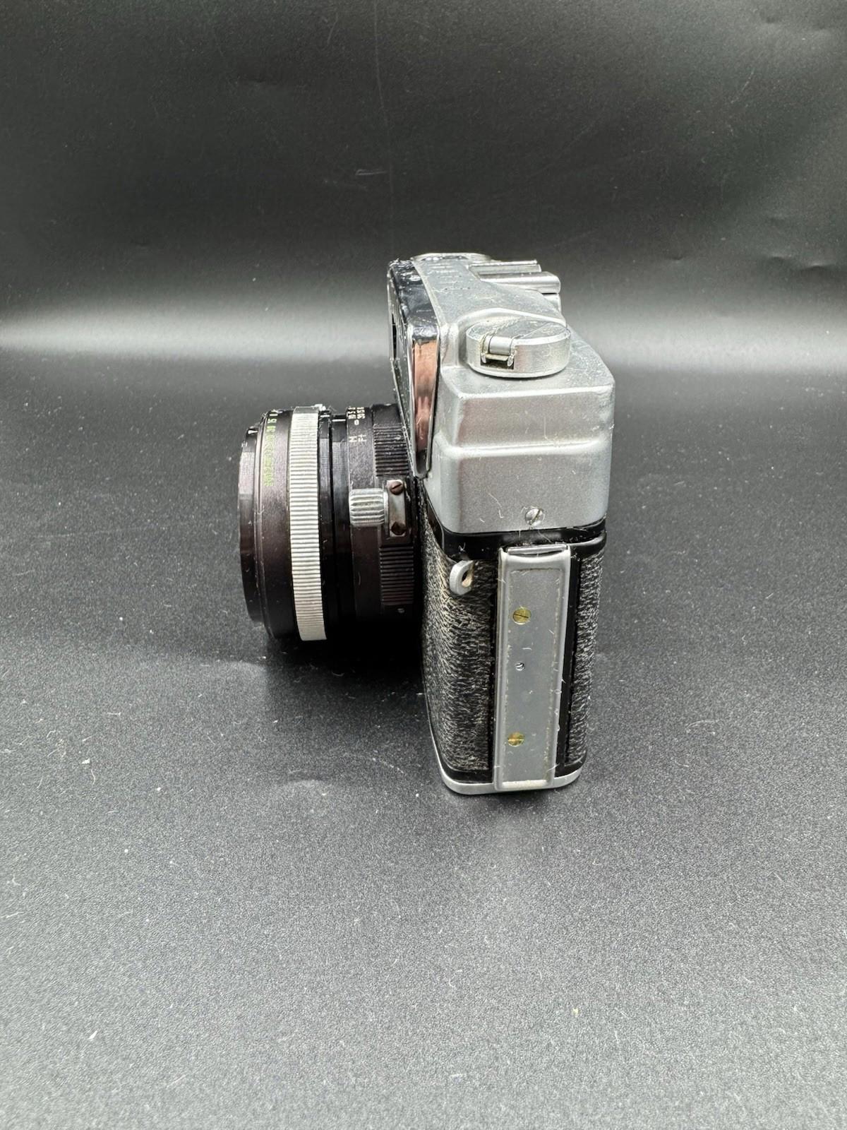 Vintage Taron Eyemax 1.8 45mm Camera Made In Japan No.20933 Untested Silver Cam
