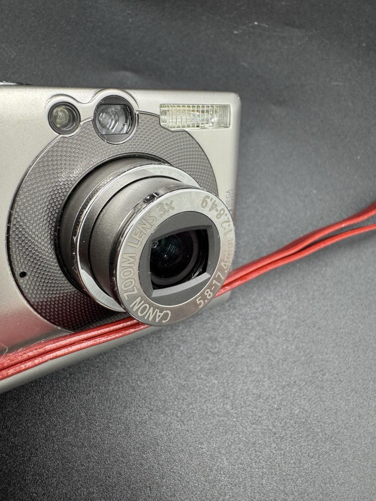 Canon PowerShot Digital ELPH SD400 5.0MP Digital Camera with Original Red Case