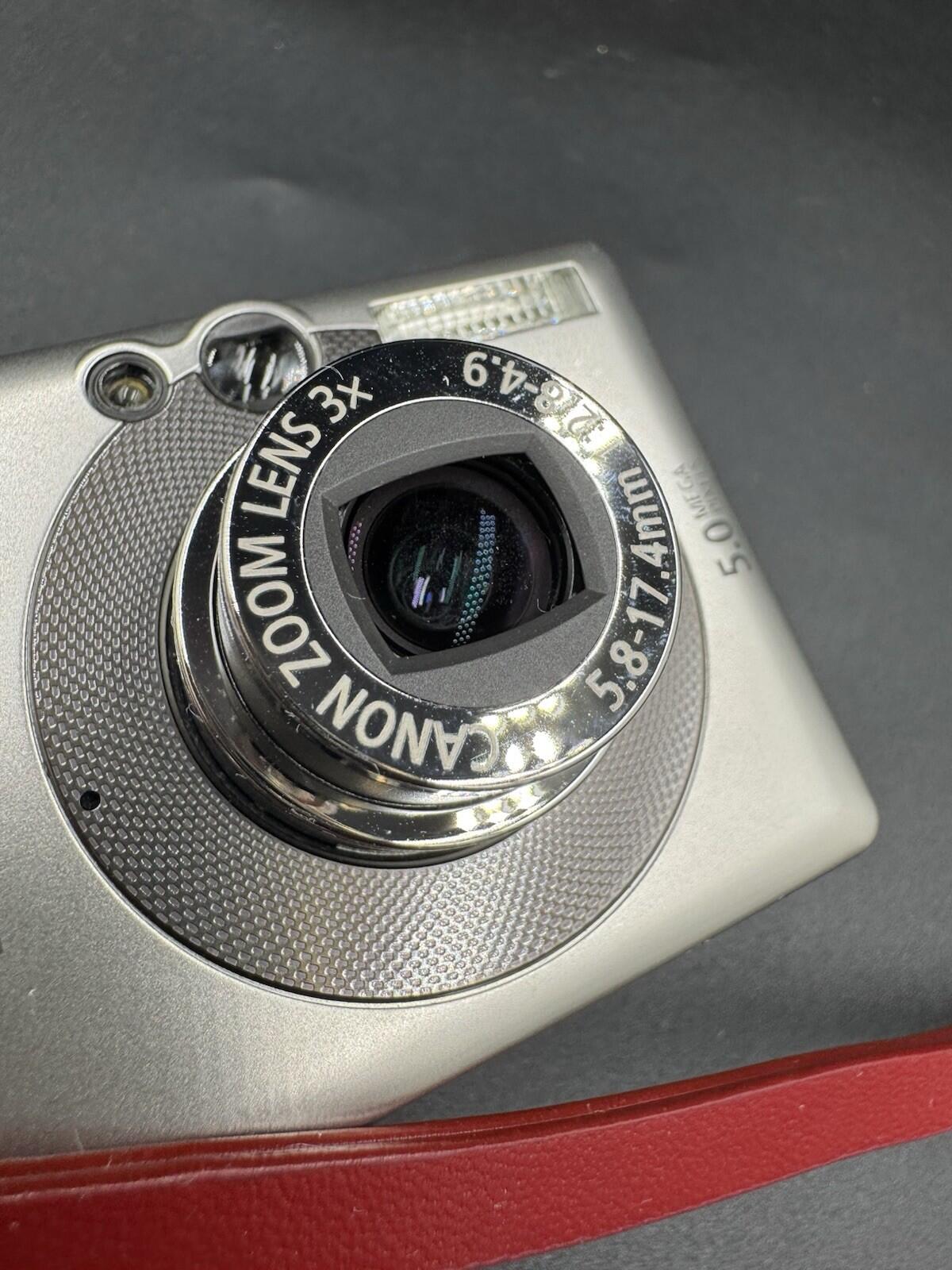 Canon PowerShot Digital ELPH SD400 5.0MP Digital Camera with Original Red Case