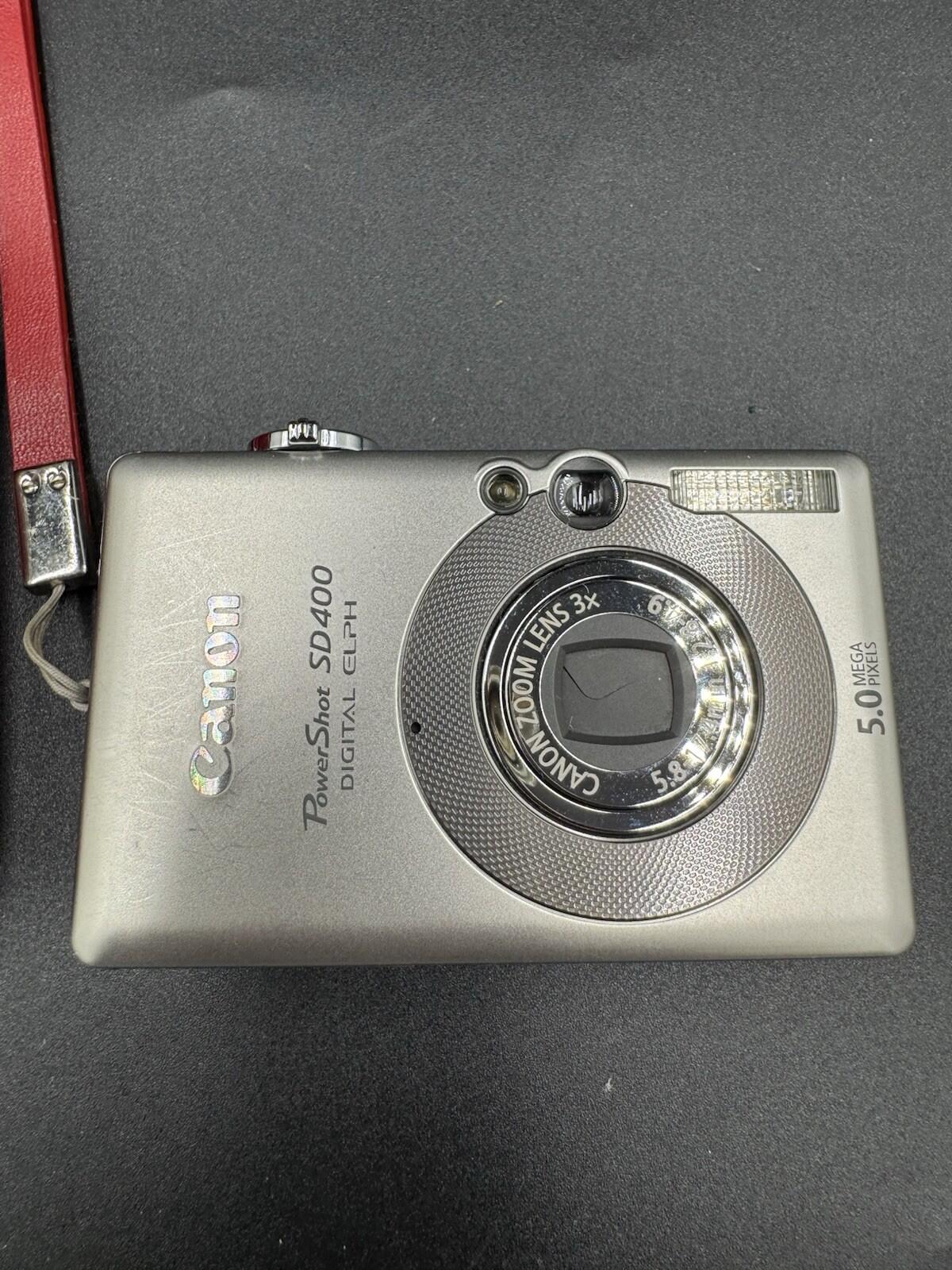Canon PowerShot Digital ELPH SD400 5.0MP Digital Camera with Original Red Case