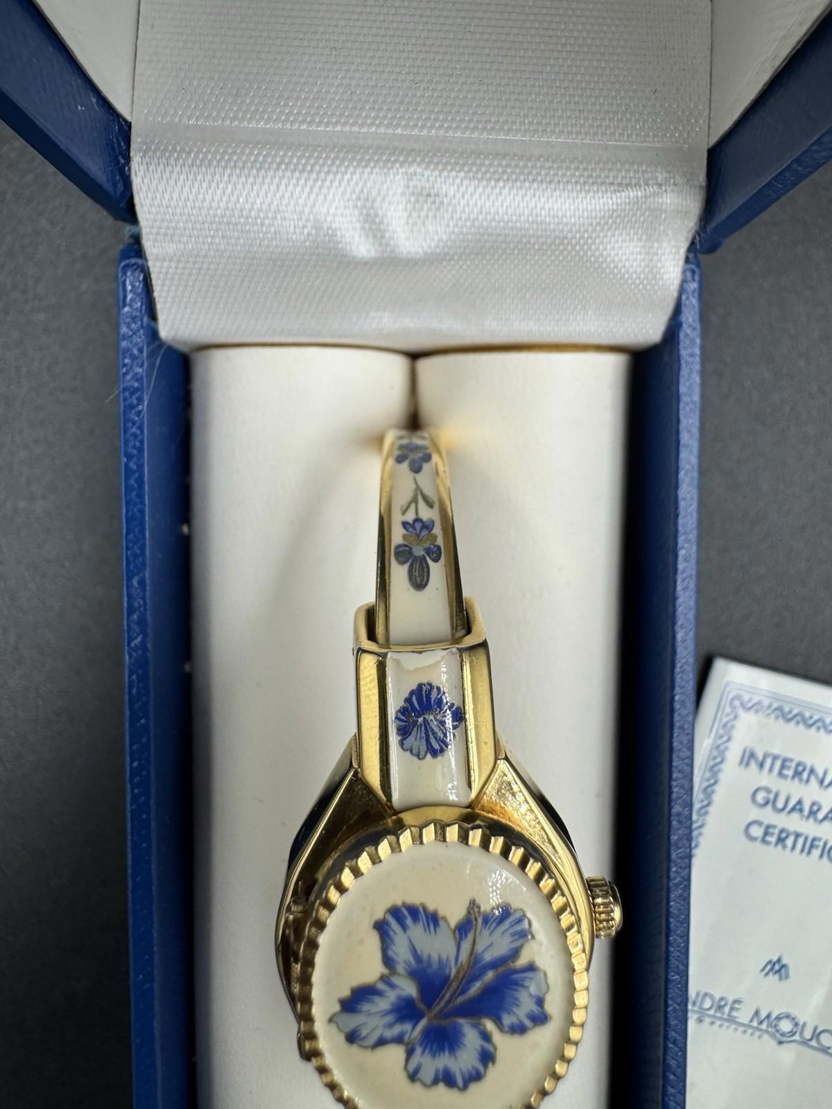 Vintage Andre Mouche Gold Tone Peekaboo Watch White Enamel Blue Flowers with box