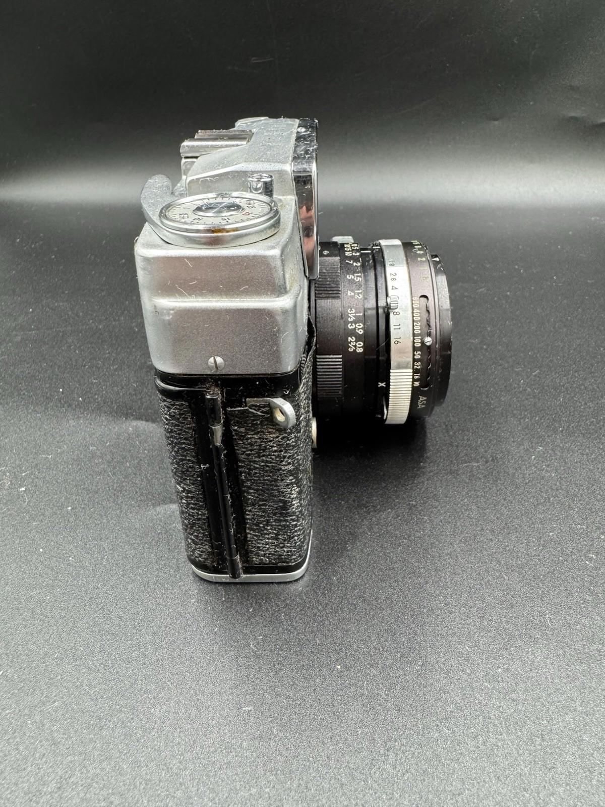 Vintage Taron Eyemax 1.8 45mm Camera Made In Japan No.20933 Untested Silver Cam