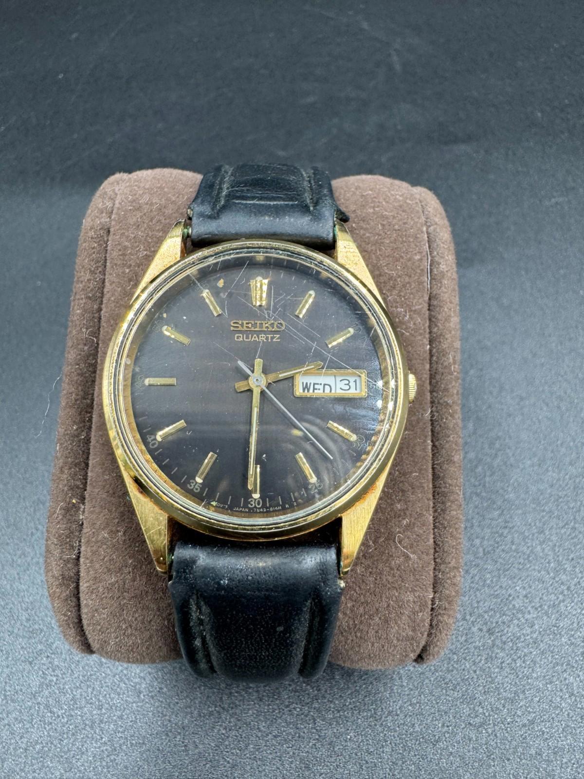 Seiko Quartz Vintage Black Dial Gold Tone Case 34mm 7N43-8128 - Needs Servicing