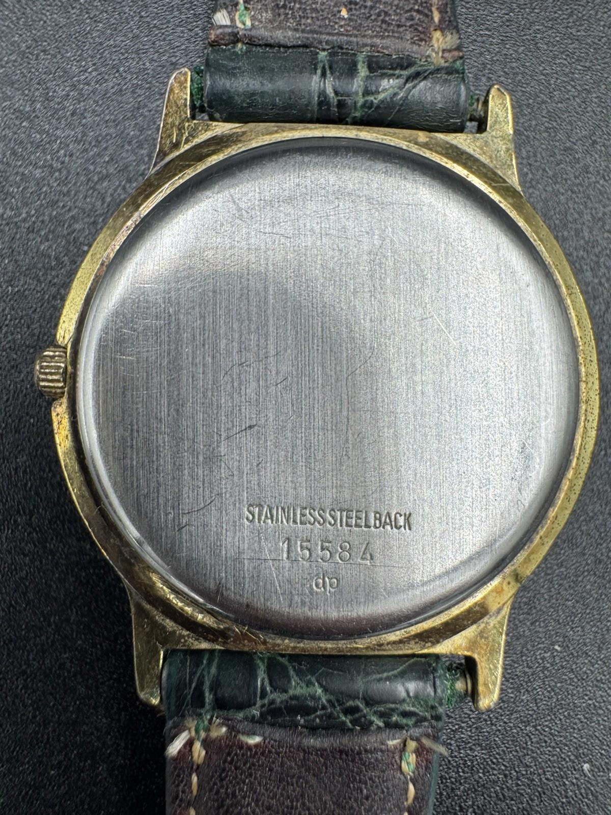 Vintage Courreges Paris Quartz Date Watch Swiss Made White Dial Green Band Great