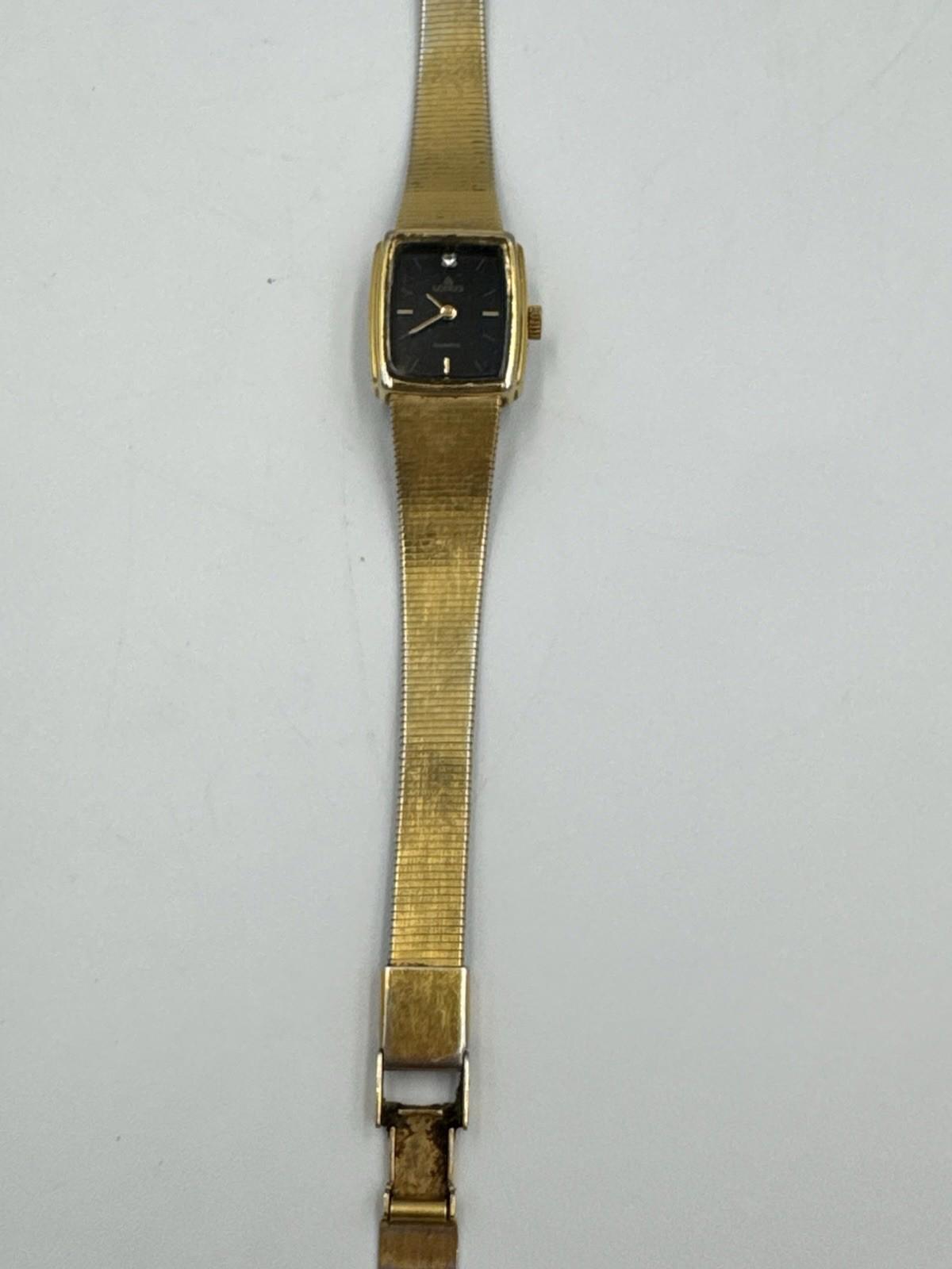 Vtg Lorus Watch Women V232-5490 16mm Gold Tone Black Dial